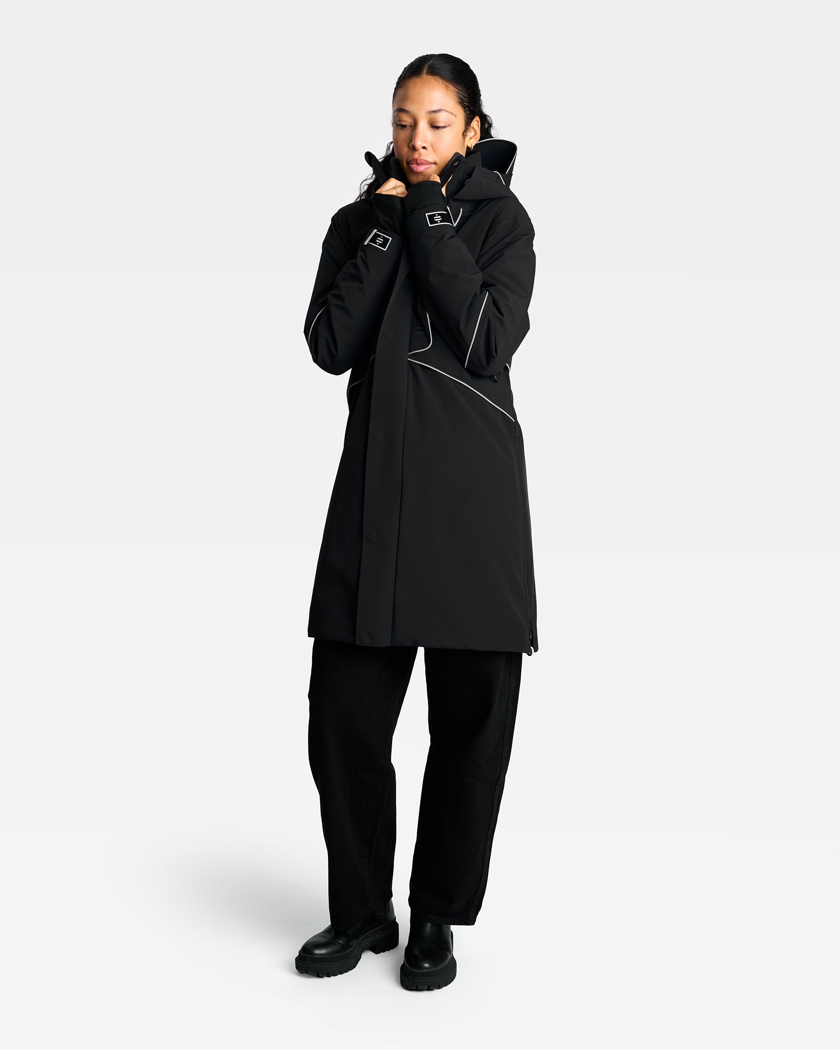 Manteau chaud hiver femme noir et performant pour le vélo
