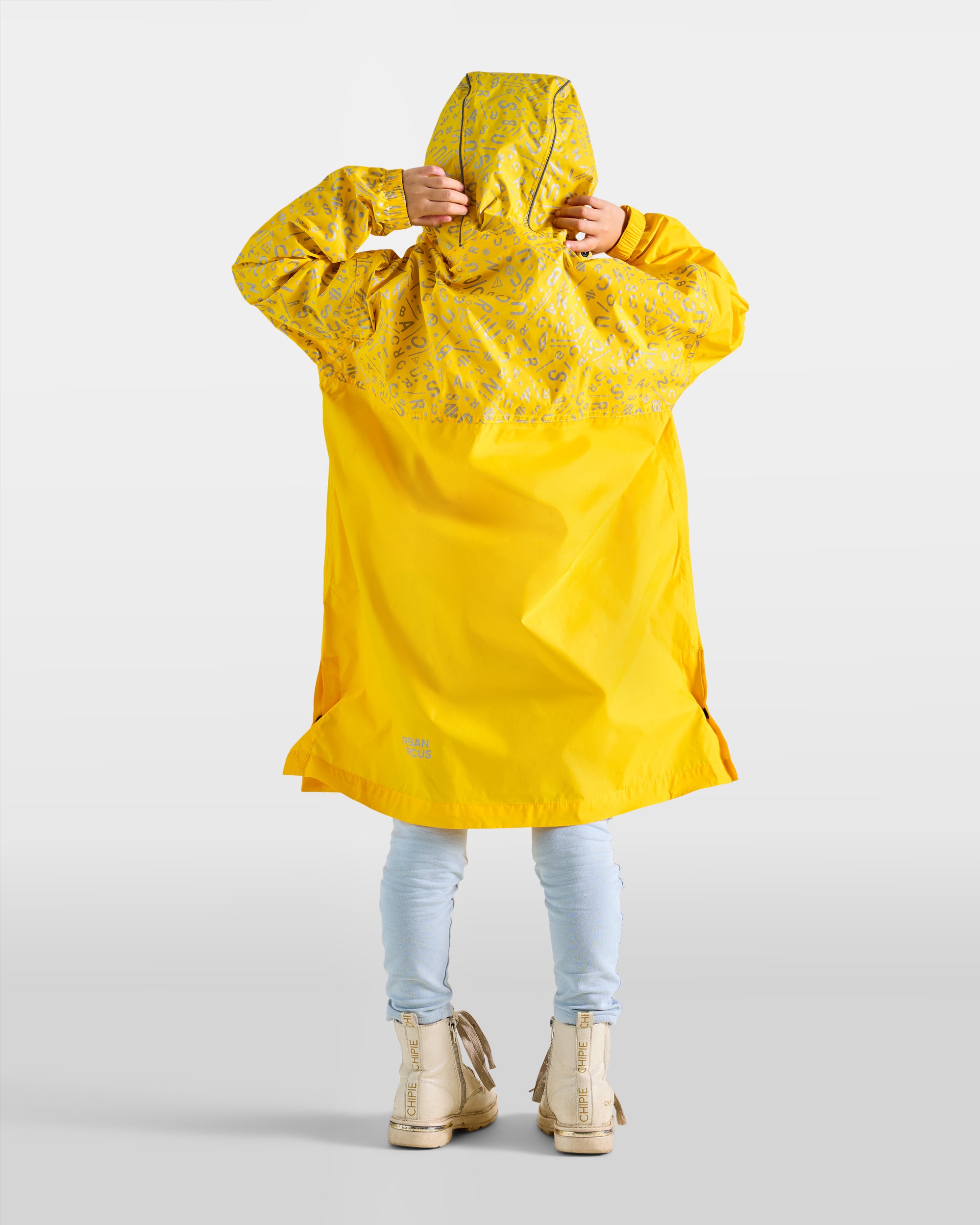 petit poncho de pluie pour enfant jaune capuche étanche pour vélo