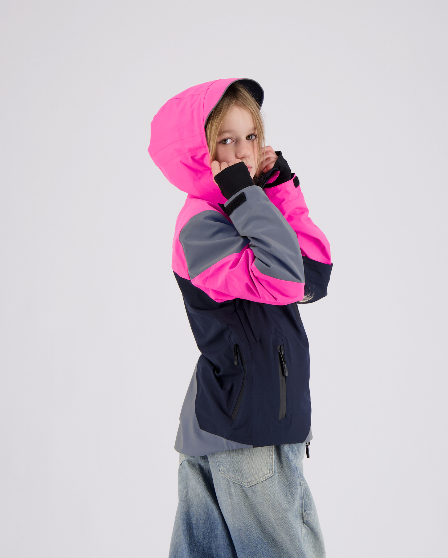 veste imperméable capuche rose bleue marine enfant vue de profil pour mobiltés urbaines