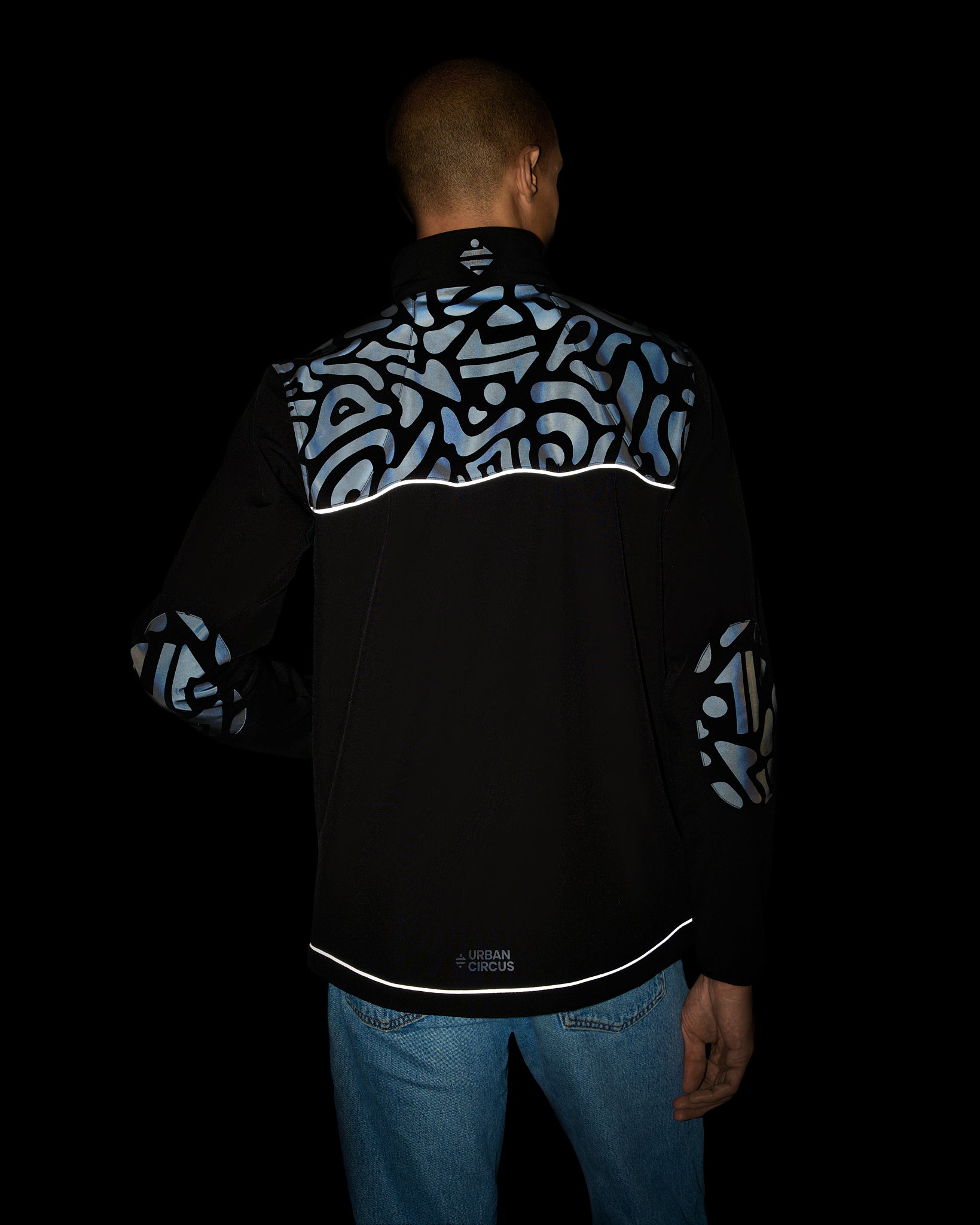 Veste déperlante chaude polaire noire motifs réfléchissants de nuit homme dos